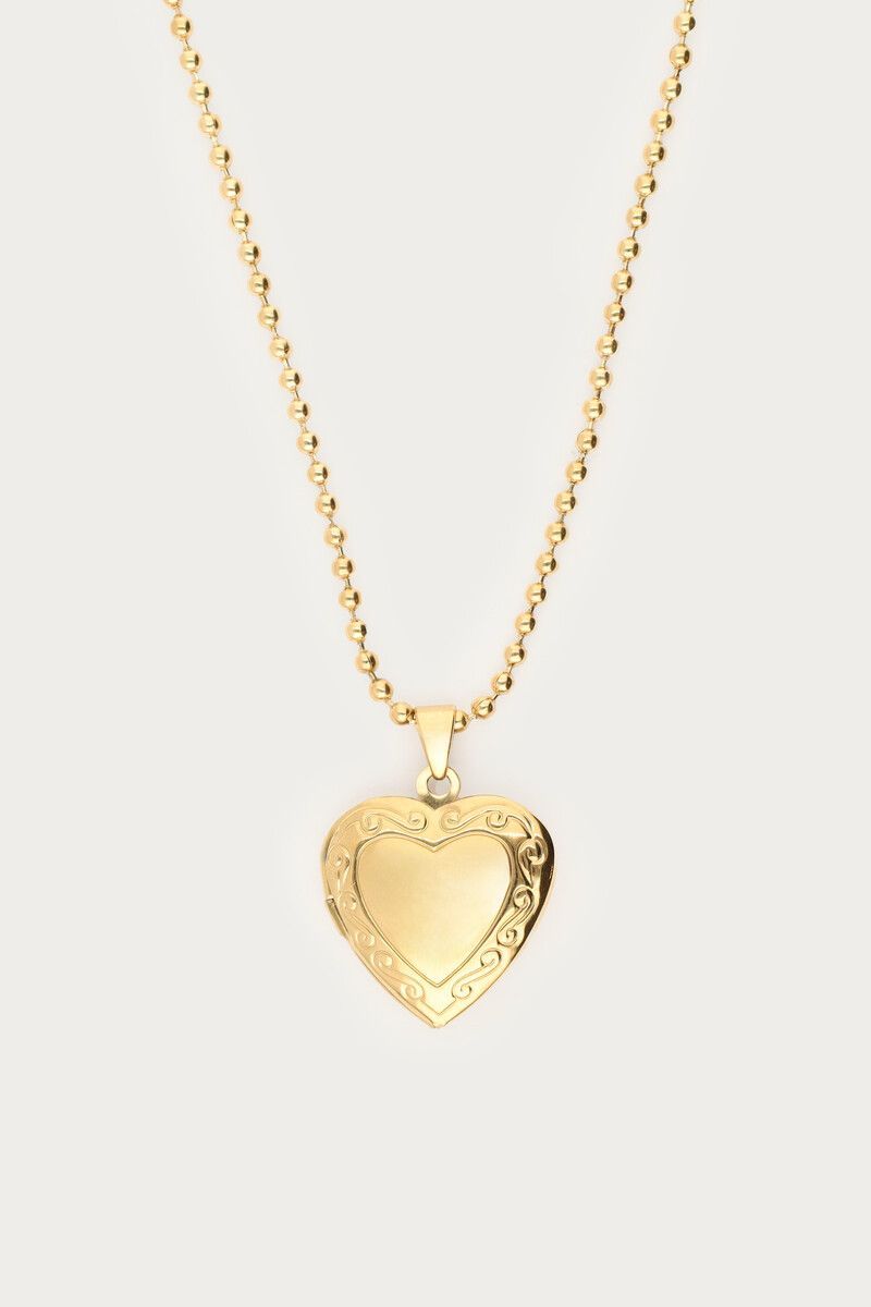 Collar largo de acero con medallón de corazón