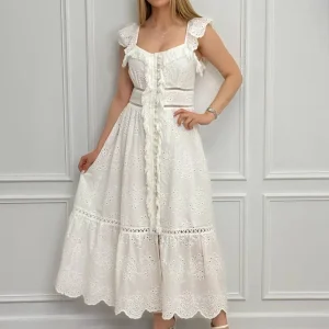 Vestido con botones de perla