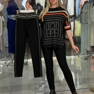 Pantalones con franjas laterales y aplicación de cuero «Triángulo»