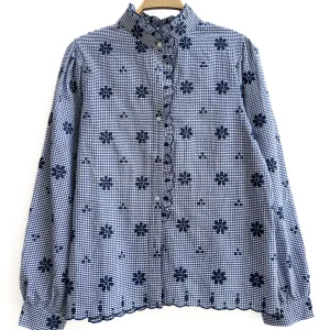 Blusa de cuadros con bordado floral