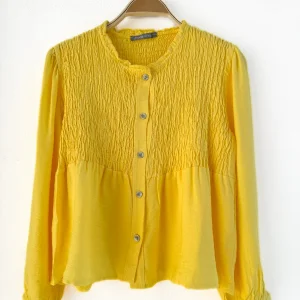 Blusa de manga larga con fruncido y botones